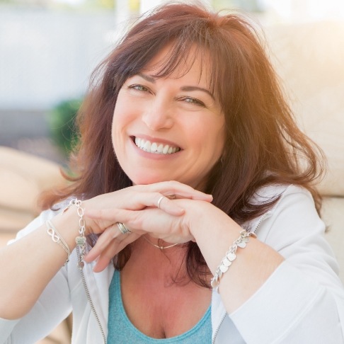 Woman sharing smile after makeover