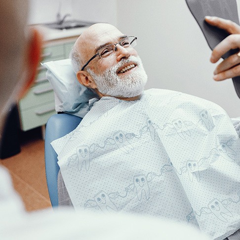 Man smiling at dentist in Brookfield
