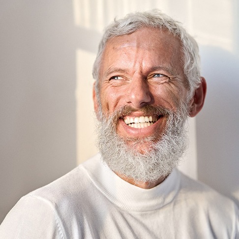 a man in Brookfield smiling with dentures