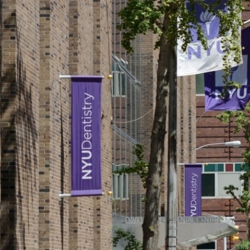 New York University school of dentistry sign outside of dental school building