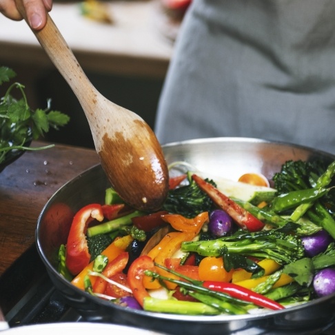 Person cooking a healthy meal