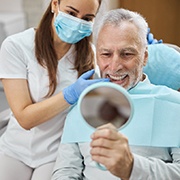 An aging gentleman who’s just received dental implants