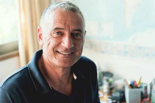 Man with healthy smile after restorative dentistry
