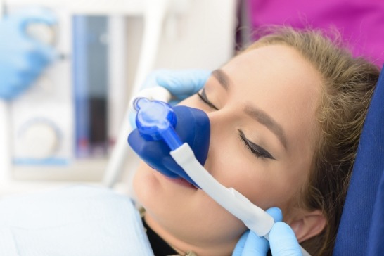 Woman receiving nitrous oxide sedation dentistry