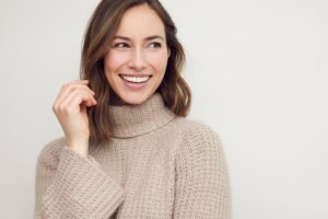 Woman showing off beautiful smile.